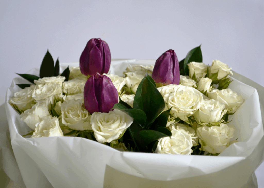 a Image of Tulips and Rose bouquets Arranged